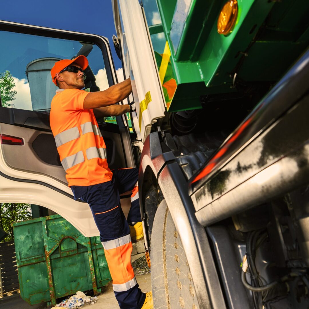 Man in Garbage Truck